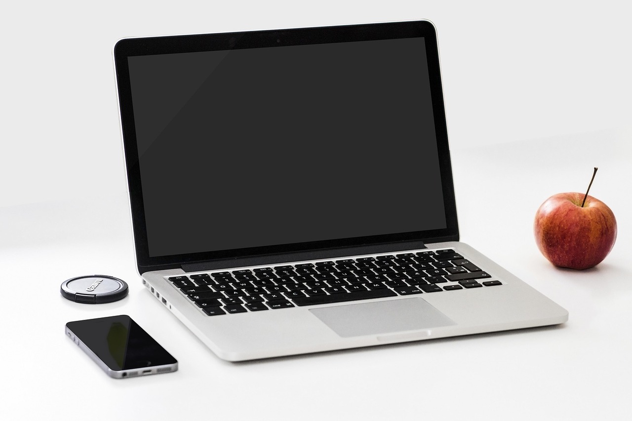 Apple, smartphone, desk — Why Schell IP is Your Best Choice for Complex Patent Application Challenges